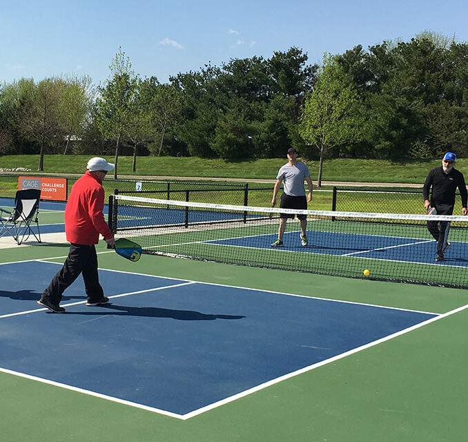 cyntheanne-pickleball-tournament men playing pickleball at cyntheanne