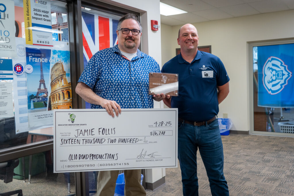 teachergrant2025_-09 jamie follis holding check with. mayor fadness