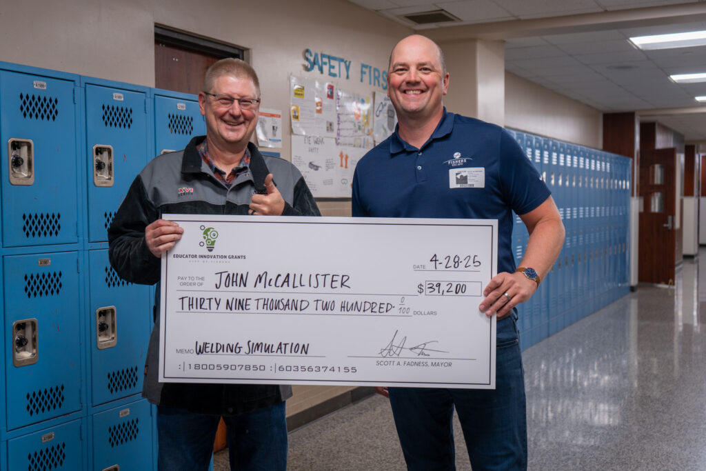 teachergrant2025_-15 john mcallister holding check with mayor fadness