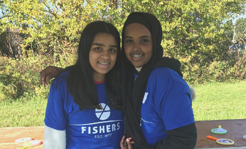 girls volunteering in woods